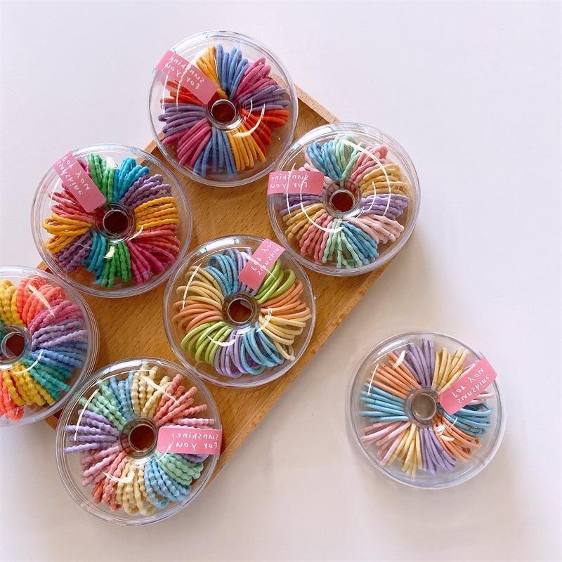 New children's fluorescent color thumb hair band 60-piece round box set, new small band hair non-damaging set Application Scenario