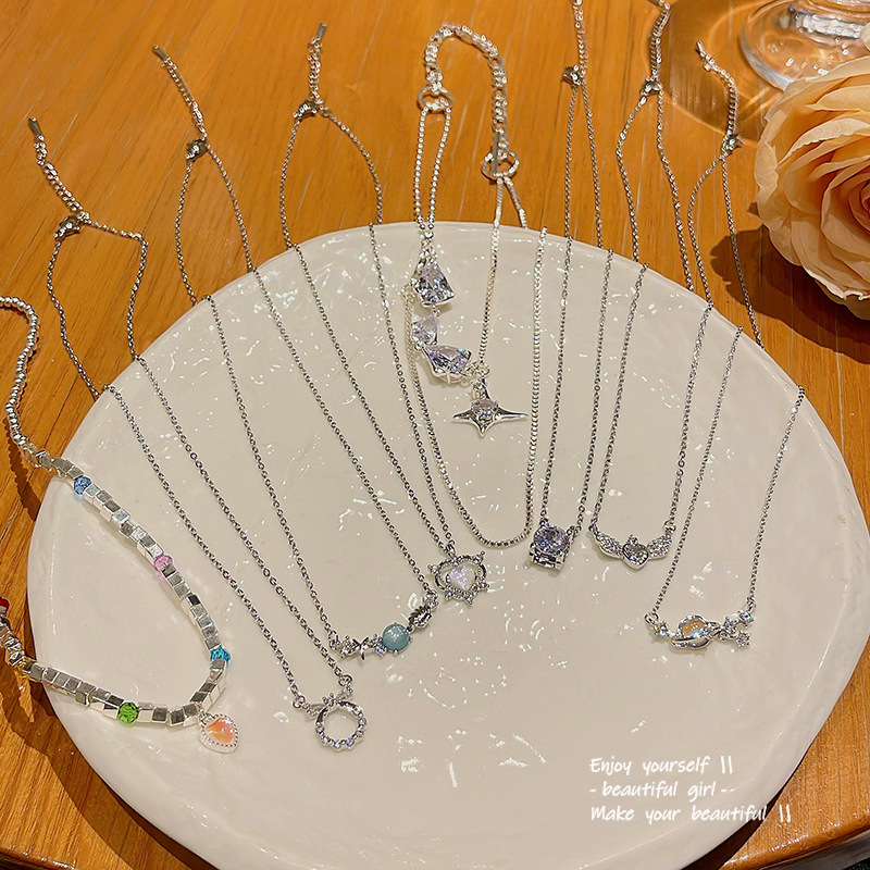 Wholesale of new Korean versatile heart-shaped pearl titanium steel necklaces with a high-end design sense in an ins style for women full figure