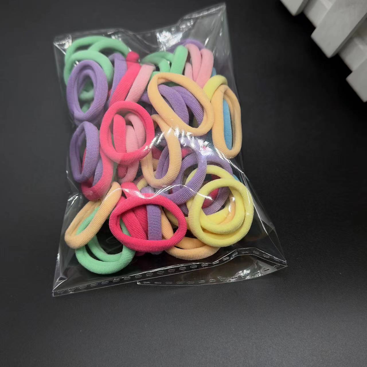 3cm towel hair tie, high-elasticity solid color towel tie, seamless leather band, small gift decoration, hair tie decoration wholesale Application Scenario