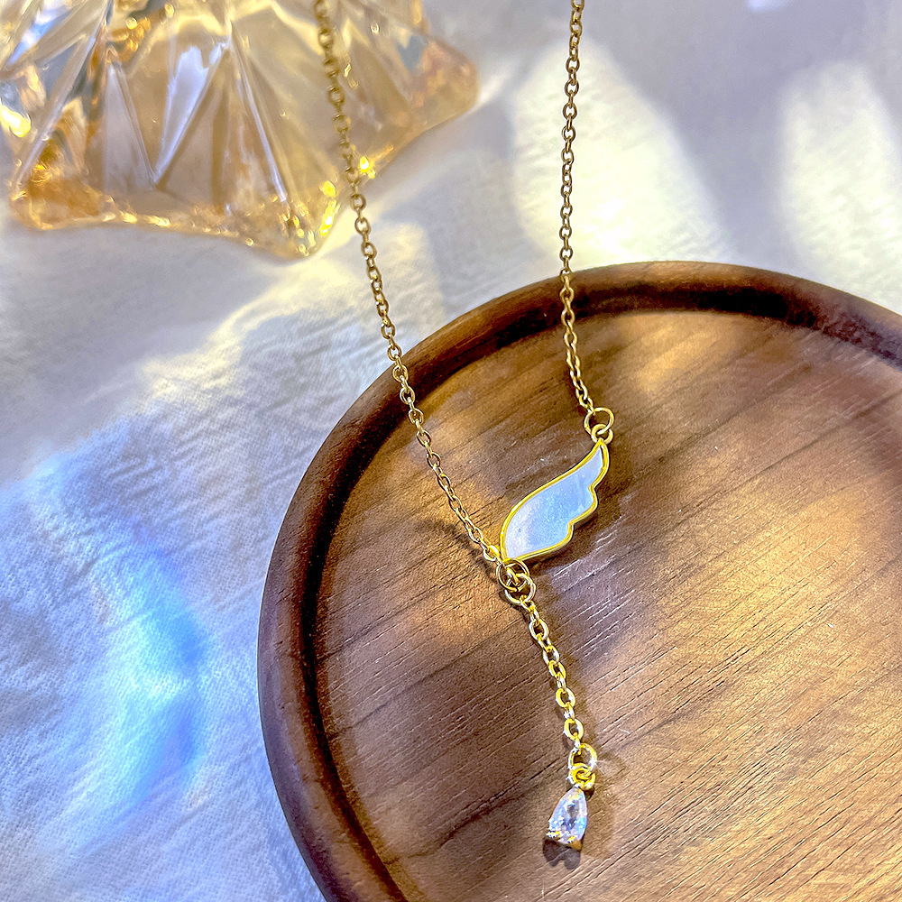 Japanese and Korean light luxury titanium steel necklace, women's niche design sense Angel wing pendant, tassel collarbone chain, non-fading accessory full figure