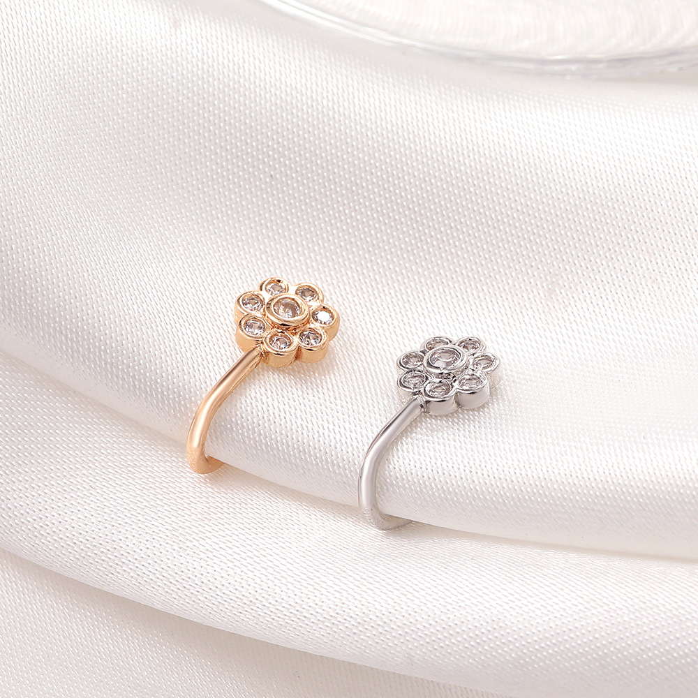 A popular flower-shaped zircon nose ring in Europe and America, a metal U-shaped micro-inlaid non-perforated nose stud, and a simple puncture accessory for export Application Scenario