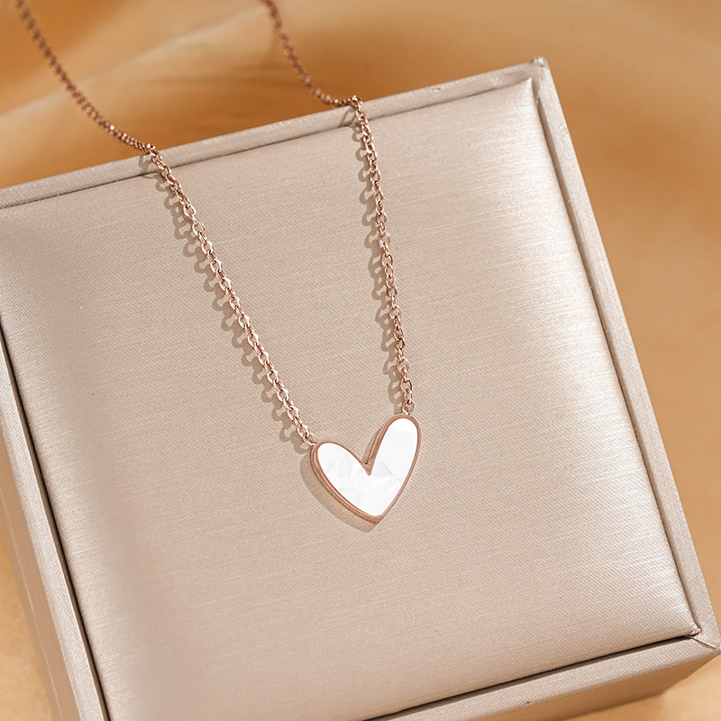 Titanium steel heart-shaped necklace, a trendy and niche design for women on Instagram, is a popular collarbone chain with an irregular heart-shaped pendant and accessory Application Scenario