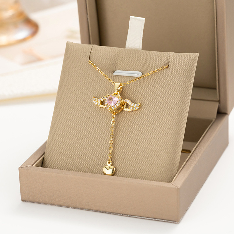 Real gold electroplated pink heart-shaped moving wing tassel necklace, female Internet celebrity light luxury design collarbone chain wholesale full figure