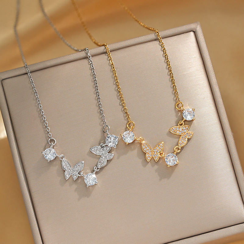 Wholesale of Korean-style fashion zircon necklace with three round diamonds and two butterfly necklaces in gold, luxurious and light luxury collarbone chain full figure