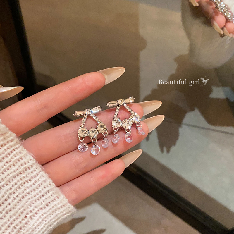 Light luxury, versatile and high-end, slightly inset zircon bow tassel stud earrings, women's super fairy-like gentle and elegant earrings and earrings full figure