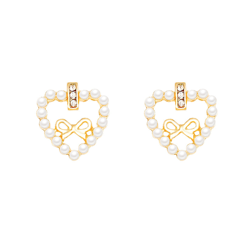 Light luxury hollowed-out heart-shaped bow pearl earrings, versatile for women, high-end and elegant stud earrings, 2025 new style earrings Item Picture