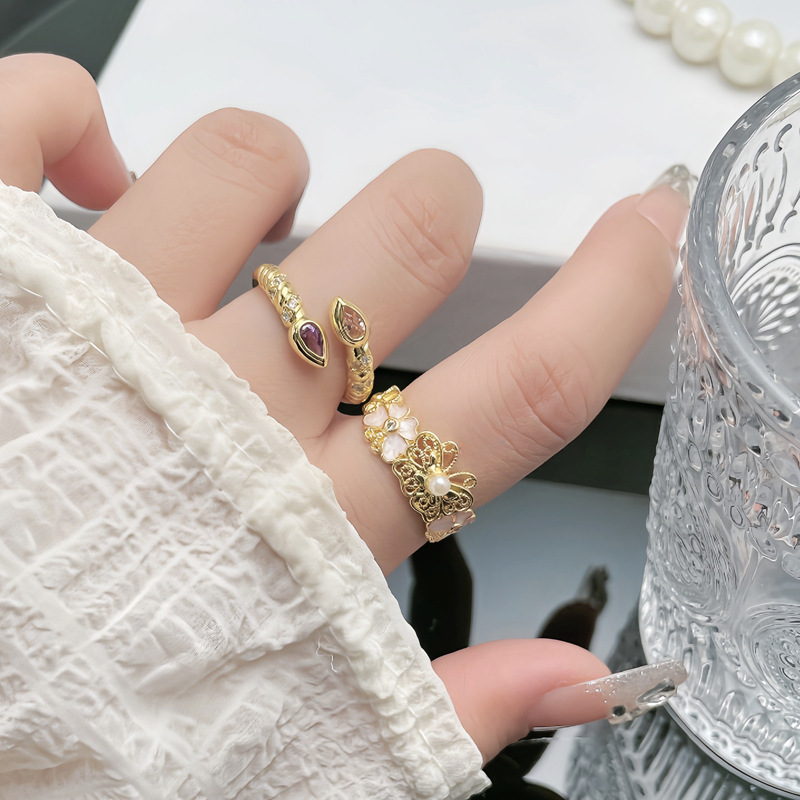 A fashionable mid-style double-stone water-drop zircon geometric open ring for women, a unique hollowed-out butterfly simple and versatile ring Application Scenario