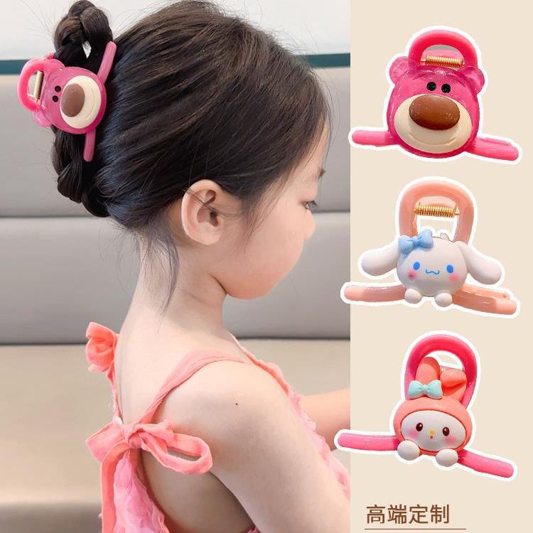 A cute cartoon strawberry bear for children, with a girl's bun bun and a dopamine hair accessory on the back of her head details Picture