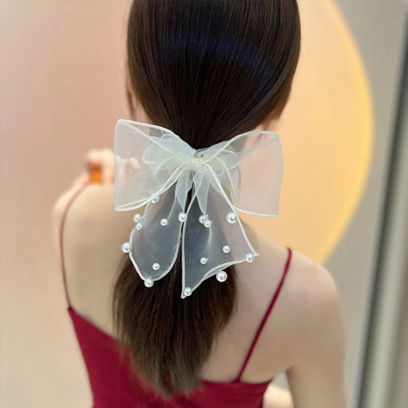 The net pearl pearl bow hair tie is simple and elegant. The ponytail hair tie and the ribbon hair band are high-end head accessories Application Scenario