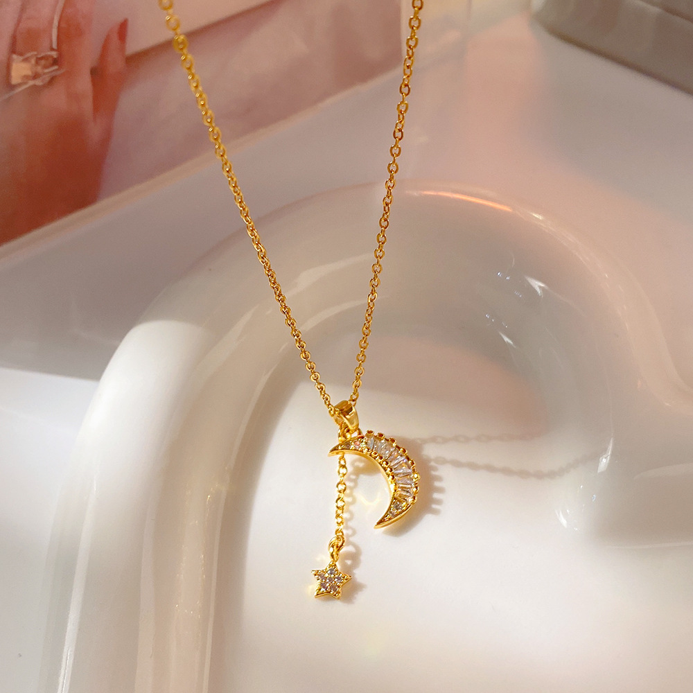 A Korean Instags-style niche design square zircon moon star tassel necklace with a light luxury and high-end look for women Application Scenario