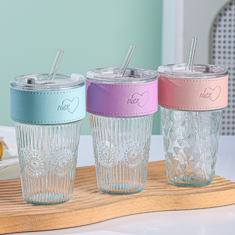A light luxury and simple glass cup with a high appearance level, a new bamboo joint cup, transparent with a cup sleeve, heat-insulating and anti-scald dual-drinking cup Application Scenario