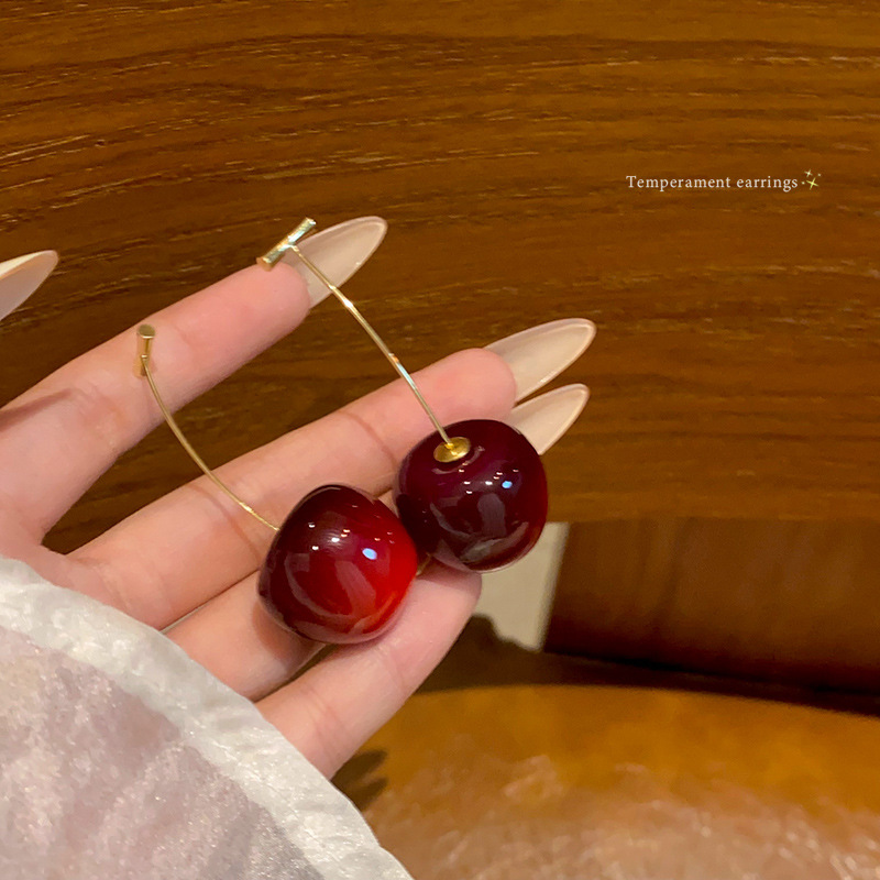 Korean bestseller cherry earrings for women on Instagram, with a trendy, high-end and elegant look. New cherry earrings for 2024 full figure