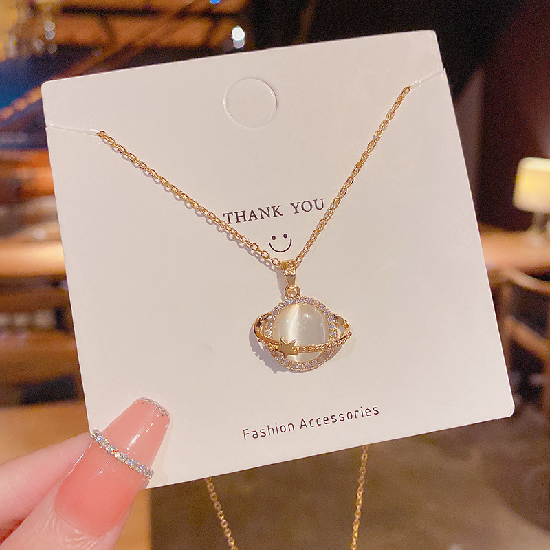 Korean high-end cat's eye stone planet pendant titanium steel necklace, female Instagram trendy fashion light luxury Internet celebrity collarbone chain neck chain details Picture