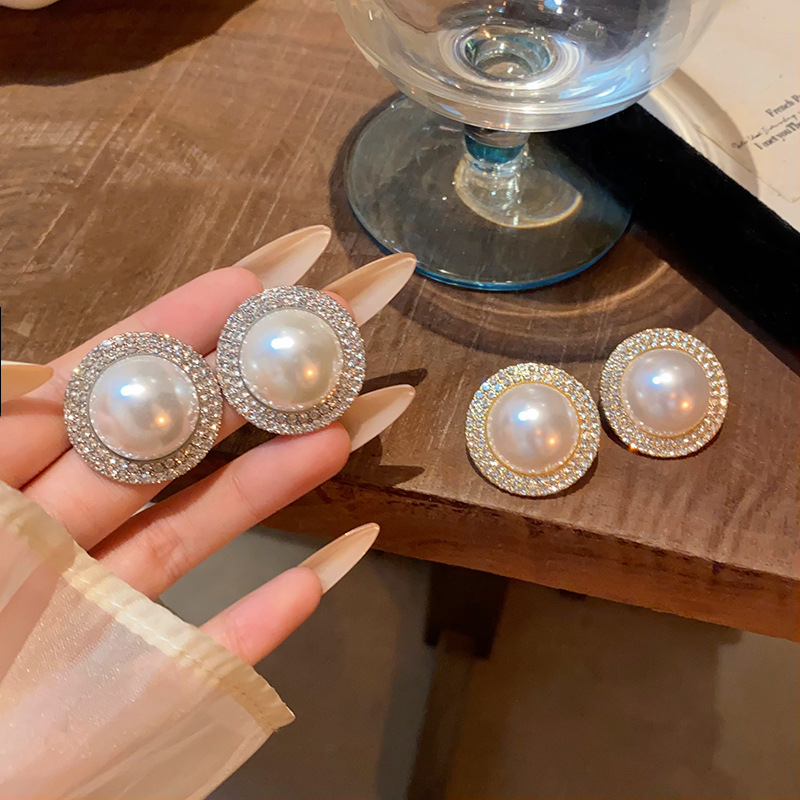 S925 Silver Needle Exaggerated Large circle pearl Earrings for women, a Korean-style light luxury and high-end look with micro-inset stud earrings, a refined and elegant ear accessory full figure