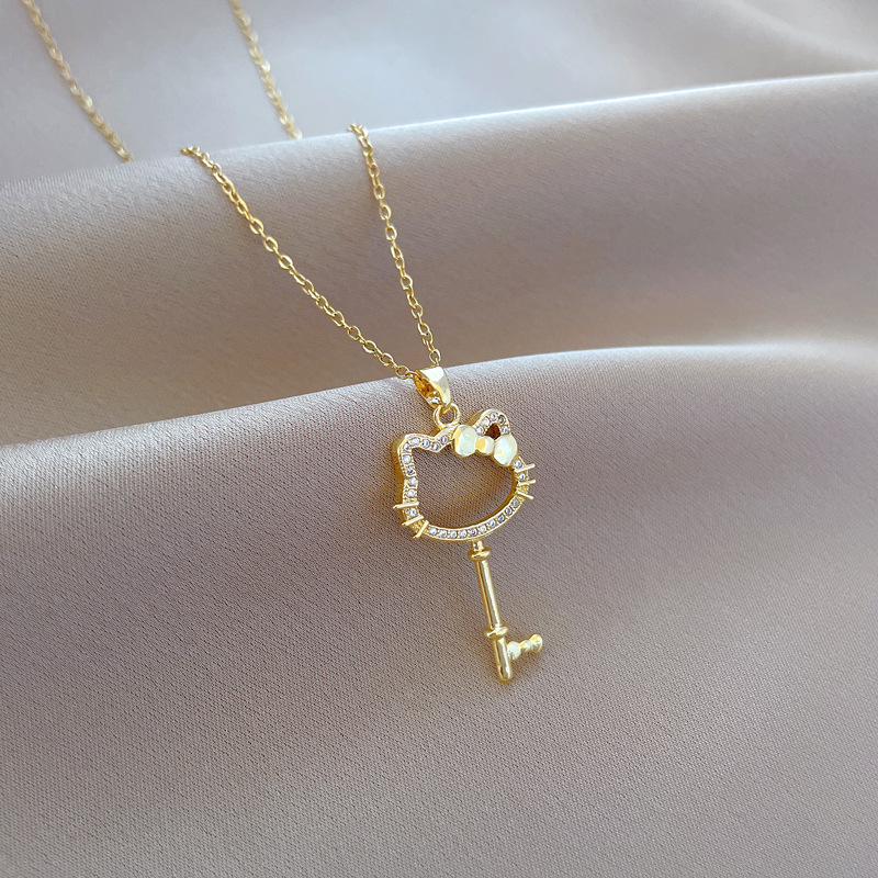 【 Titanium Steel 】 Cat bow key, elegant and luxurious, full diamond necklace, versatile collarbone chain, titanium steel chain Specification drawing