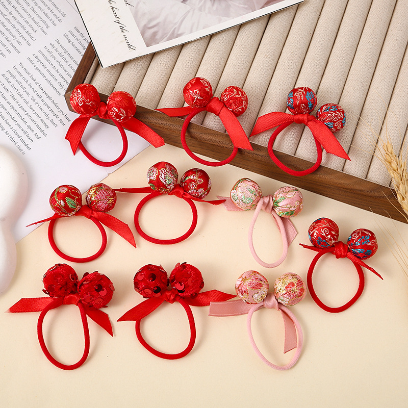 Wholesale red New Year satin lace matching children and girls' hair bands, Chinese-style hair ties, and festive bun hair ties full figure