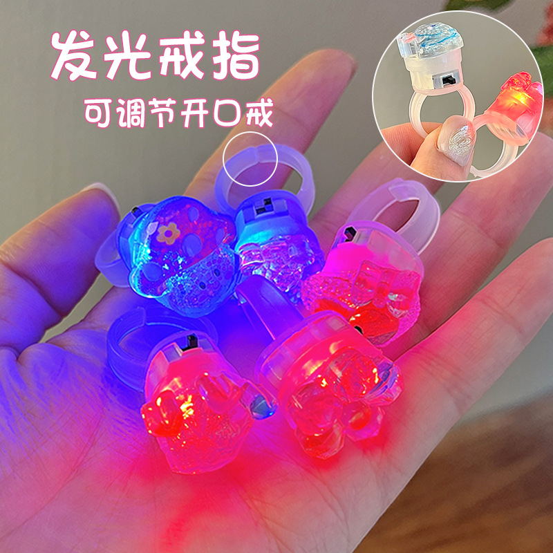 A cute little girl with a flowing sand glowing ring, a flashing light ring with a switch, cartoon jewelry, and a girl's ring Specification drawing