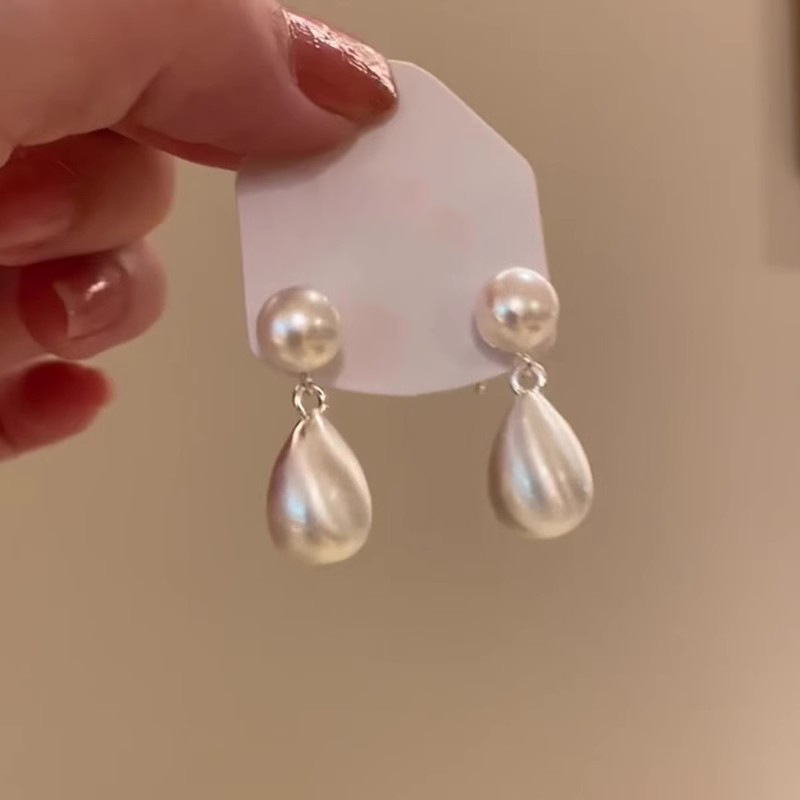 Metal brushed water drop tassel earrings 2025 new bestseller, elegant stud earrings, high-end, niche and light luxury earrings for women full figure