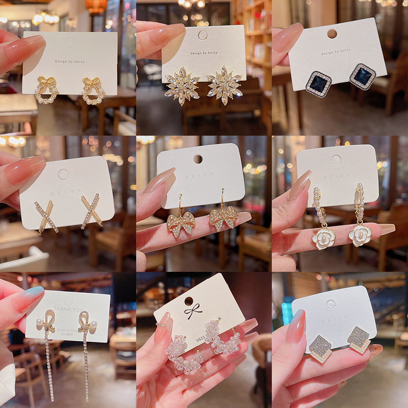 S925 Silver needle micro-inlay exquisite asymmetrical fishtail earrings, high-end design sense, long tassel butterfly stud earrings Specification drawing