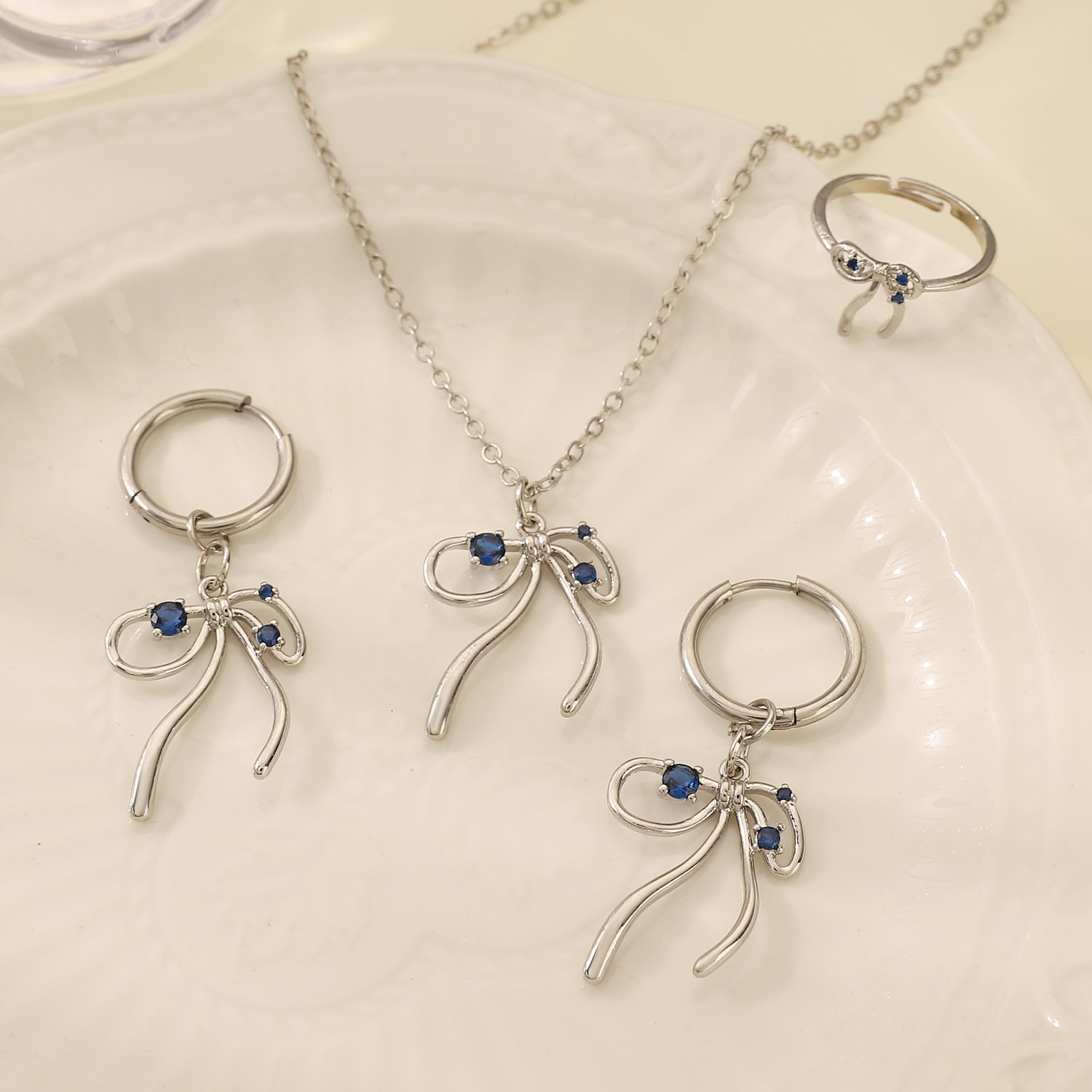 European and American cross-border ins Zircon bow earrings, earrings, rings, necklaces, women's jewelry set, high-end three-piece set Specification drawing