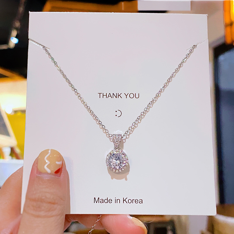 A fashionable and light luxury zirconia round pendant titanium steel necklace with a feminine and high-end feel, a popular collarbone chain that is selling well across the border details Picture