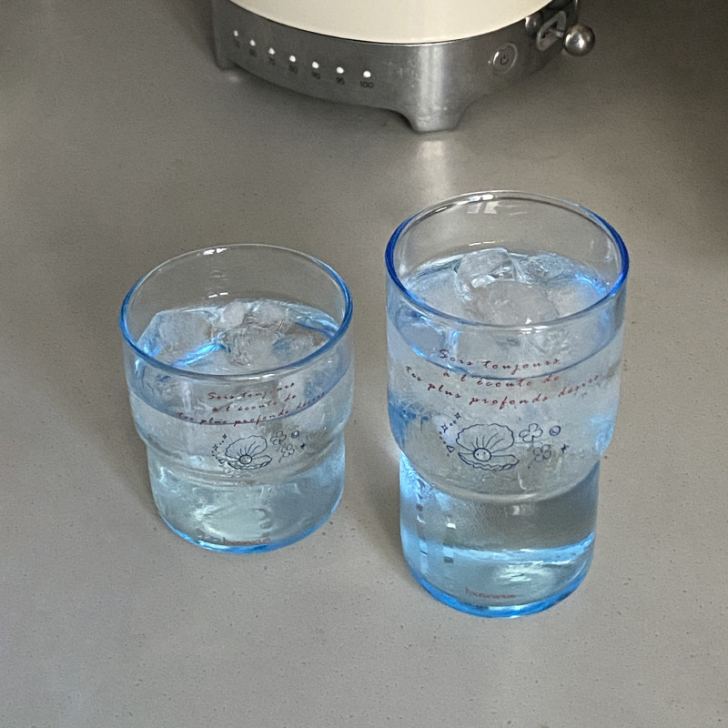 Niche original high-temperature resistant ice blue glass coffee cup, ins design sense, shell French romantic water cup texture Application Scenario