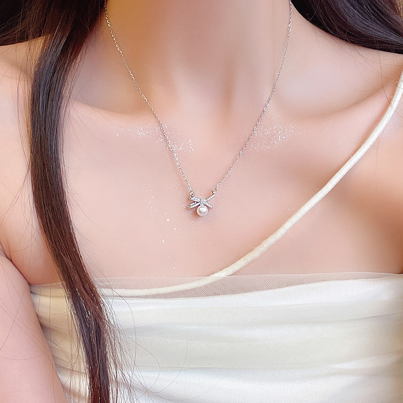 Exquisite micro-inlay bow necklace, pearl pendant, versatile for women, high-end and light luxury neckchain, popular collarbone chain accessory details Picture