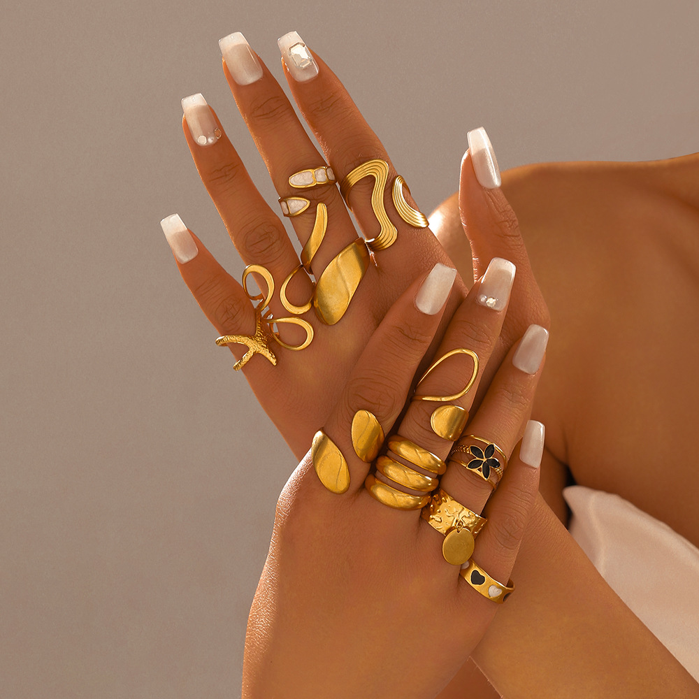 European and American cross-border stainless steel ring for women, with a light luxury and high-end feel, irregular-line gold-plated open ring jewelry set details Picture