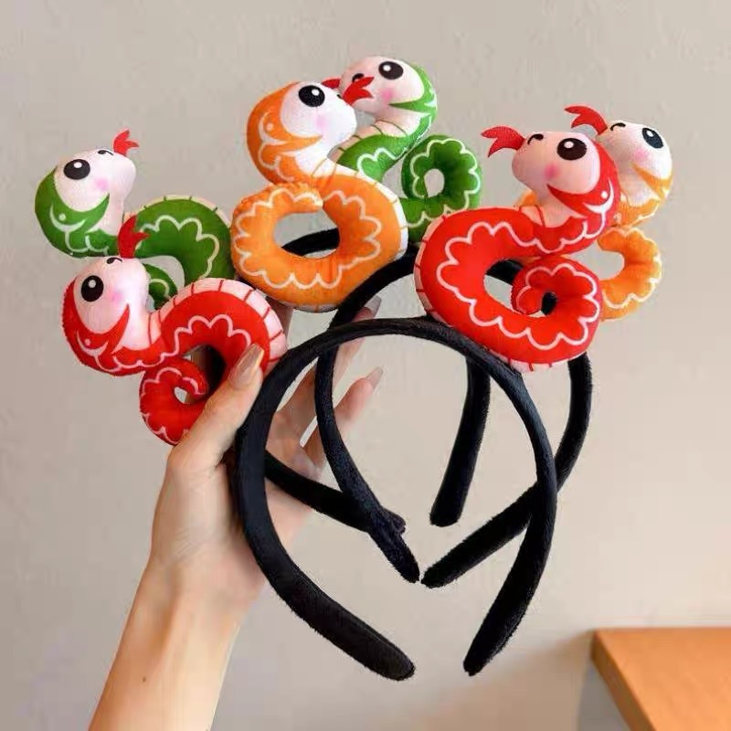 Hair bands for the Year of the Snake and the zodiac year, New Year cartoon zodiac doll headbands, autumn and winter New Year atmosphere hairpins, New Year greeting headwear Application Scenario