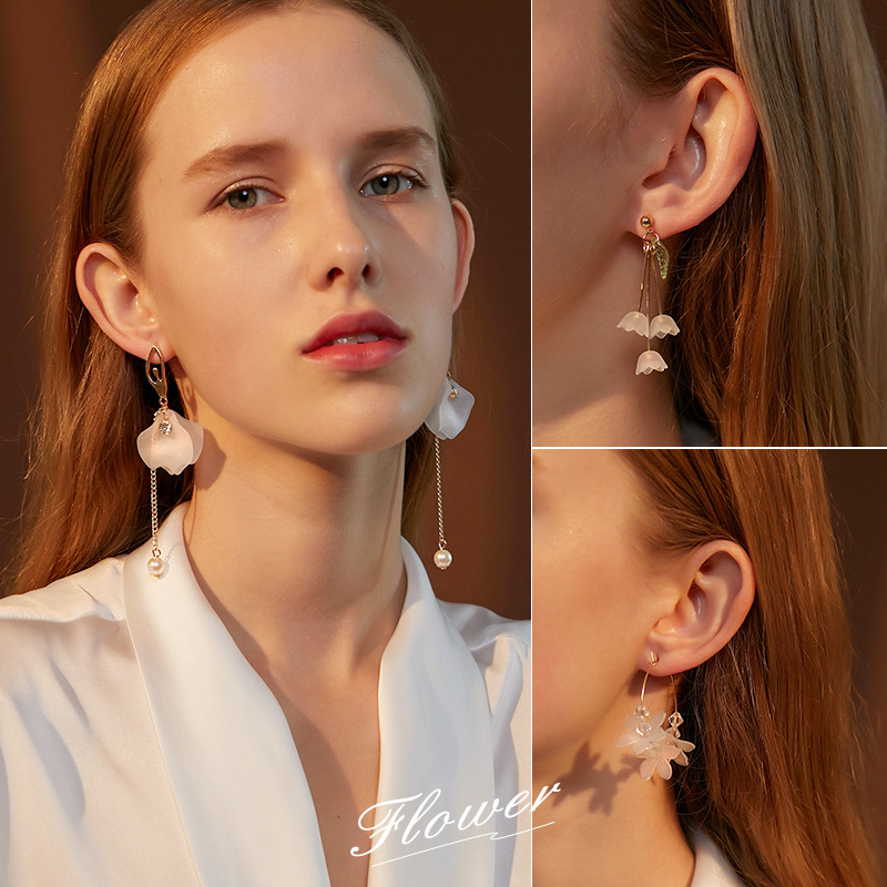 The new ice flower tassel earrings, a stylish long multi-layer crystal petal ear ring, are popular earrings in Dongdaemun, South Korea full figure
