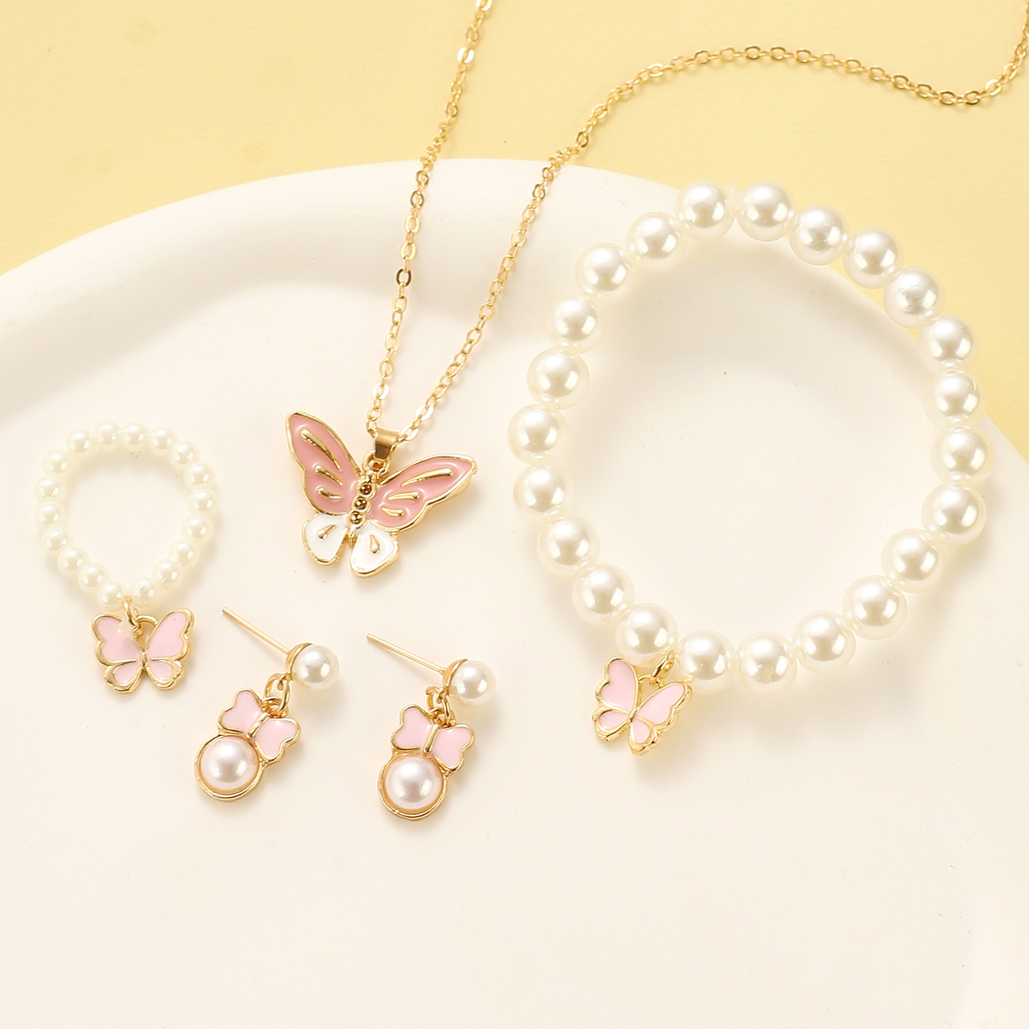 European and American versatile and personalized oil-dripping butterfly stud ring, bracelet, necklace four-piece set, fashionable pearl set jewelry for women details Picture