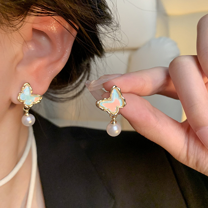 Super ethereal butterfly pearl earrings, women's light luxury, niche and high-end feel, sweet and unique ear studs, best-selling earrings wholesale details Picture
