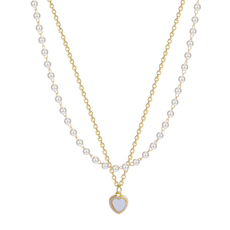 Korean niche pearl double-layer titanium steel necklace, female personality cat's eye stone heart pendant, fresh and sweet collarbone chain Item Picture