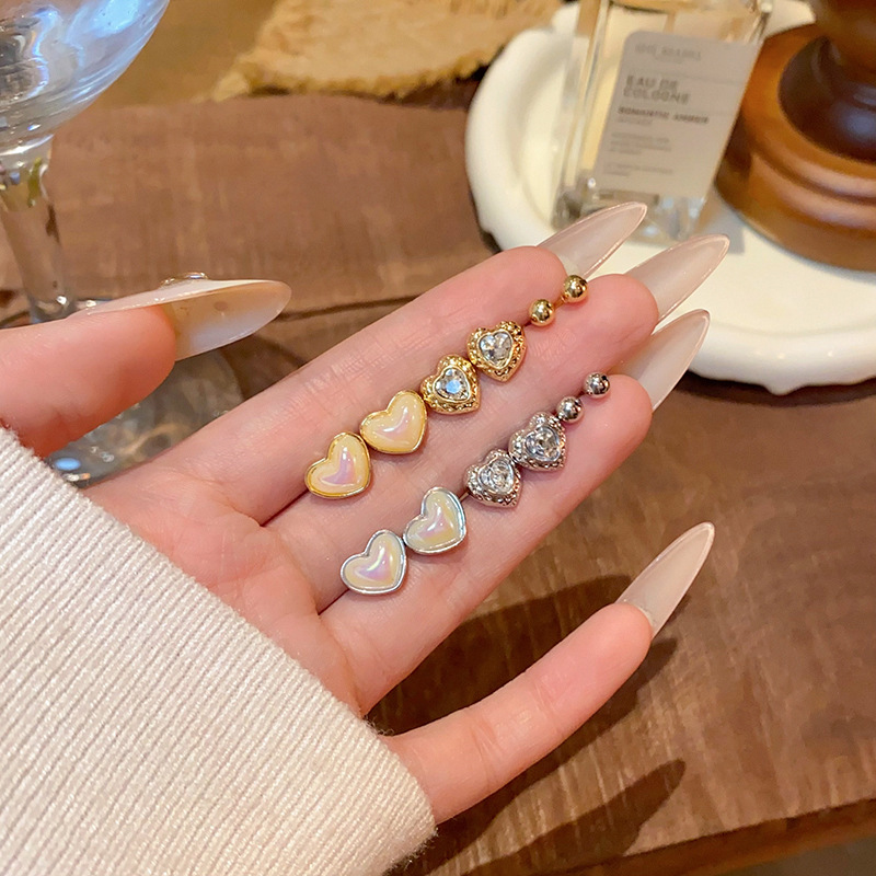 Korean-style high-end heart-shaped set earrings for women's autumn and winter, versatile and unique, simple earrings wholesale full figure