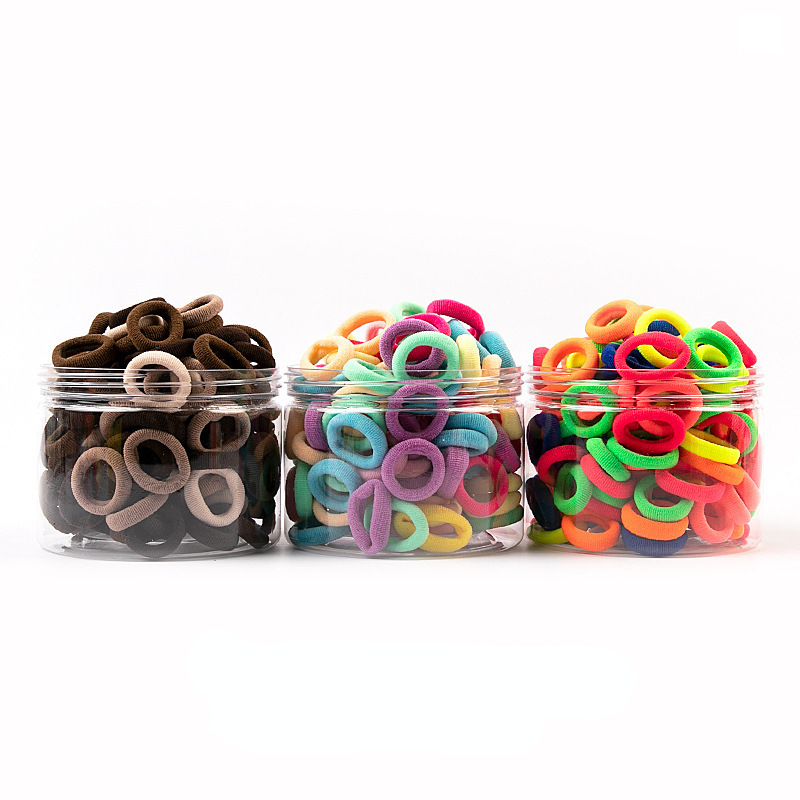 Wholesale of 100 pieces per can of new Korean-style children's hair accessories, high-elasticity towel bands, seamless small, candy-colored hair bands full figure