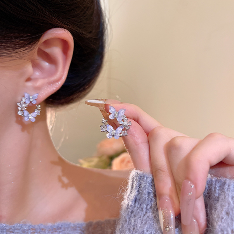 Super fairy blue diamond-encrusted butterfly earrings, cold style, niche design sense, elegant stud earrings, fashionable and versatile earrings wholesale details Picture