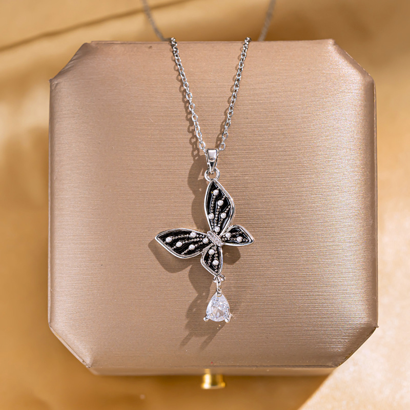 European and American fashionable and elegant pearl oil drip butterfly necklace, high-end design sense for women, tassel pendant, popular and versatile accessory details Picture
