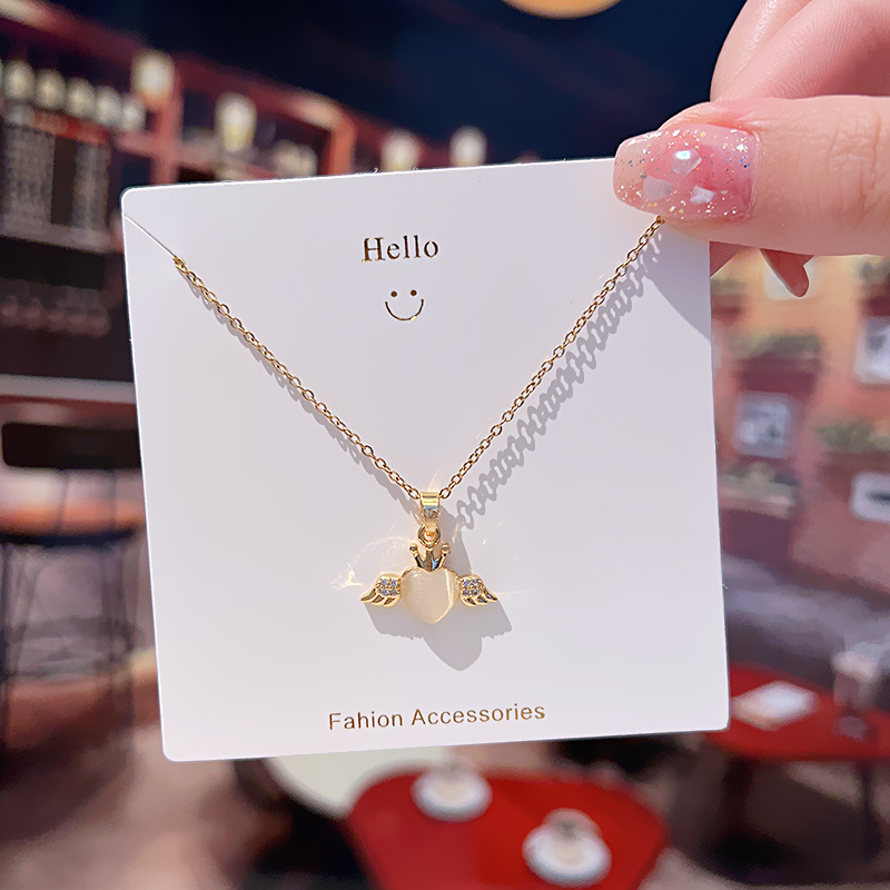 Cat's eye stone heart-shaped small wing necklace, a niche design for women, a popular collarbone chain, a cold style high-end neckchain accessory details Picture