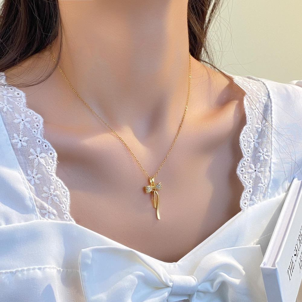 Korean version simple 18k gold-plated tassel bow necklace, a rare and light luxury titanium steel collarbone chain, a popular accessory for women Specification drawing