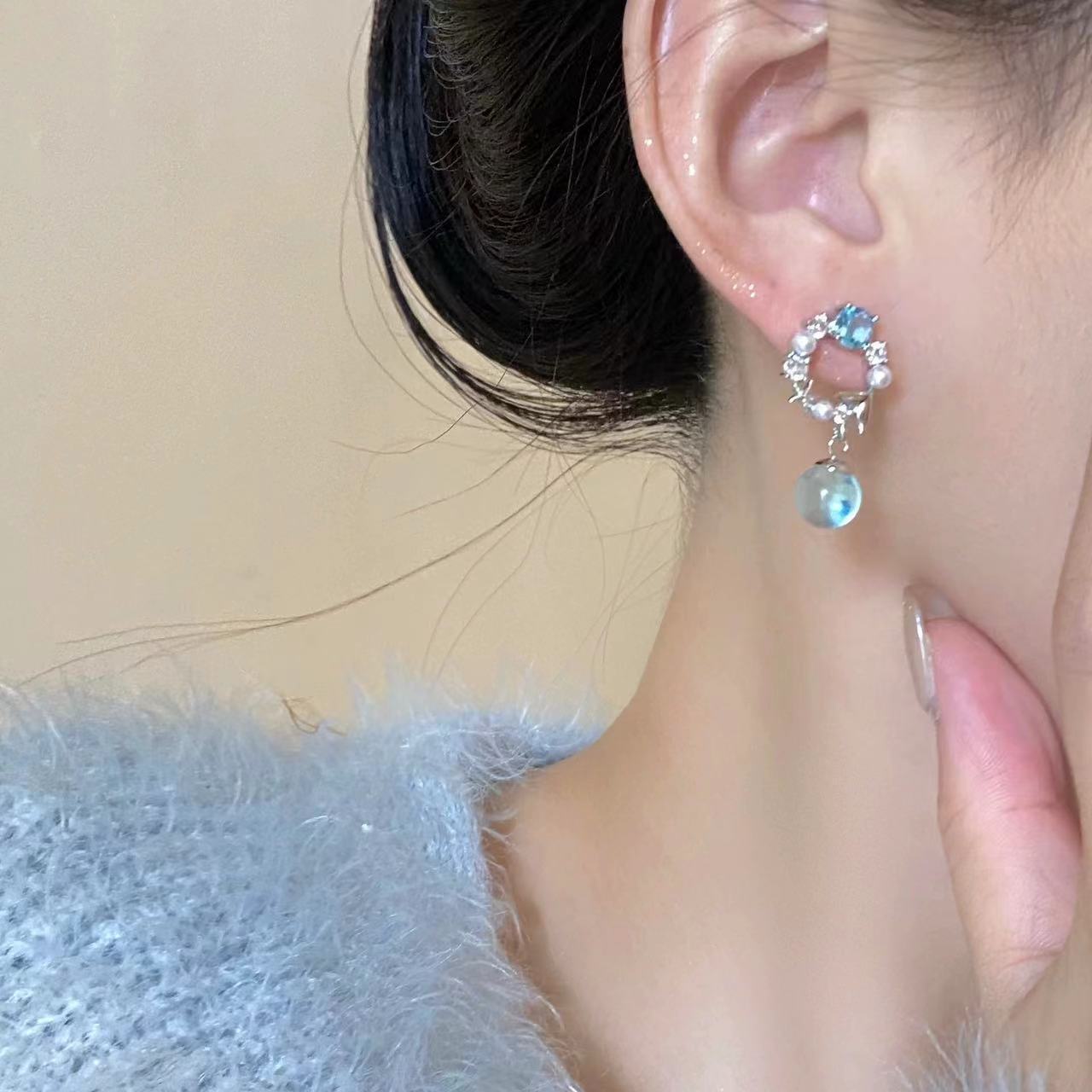 Super fairy-like blue crystal earrings, women's micro-inlaid zircon pearl stud earrings, versatile, elegant and high-end light luxury earrings wholesale Application Scenario