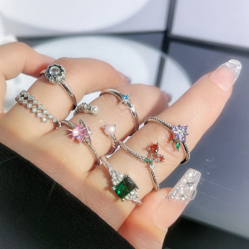 This niche, light luxury, and high-end colored zircon open ring is a versatile and fashionable choice for women. It features an irregular geometric style and a trendy ring design details Picture