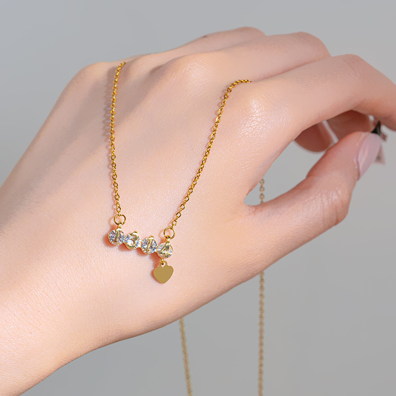 "Forever and Ever 1314 diamond-encrusted titanium steel necklace, women's heart tassel pendant, light luxury and high-end collarbone chain accessory. details Picture