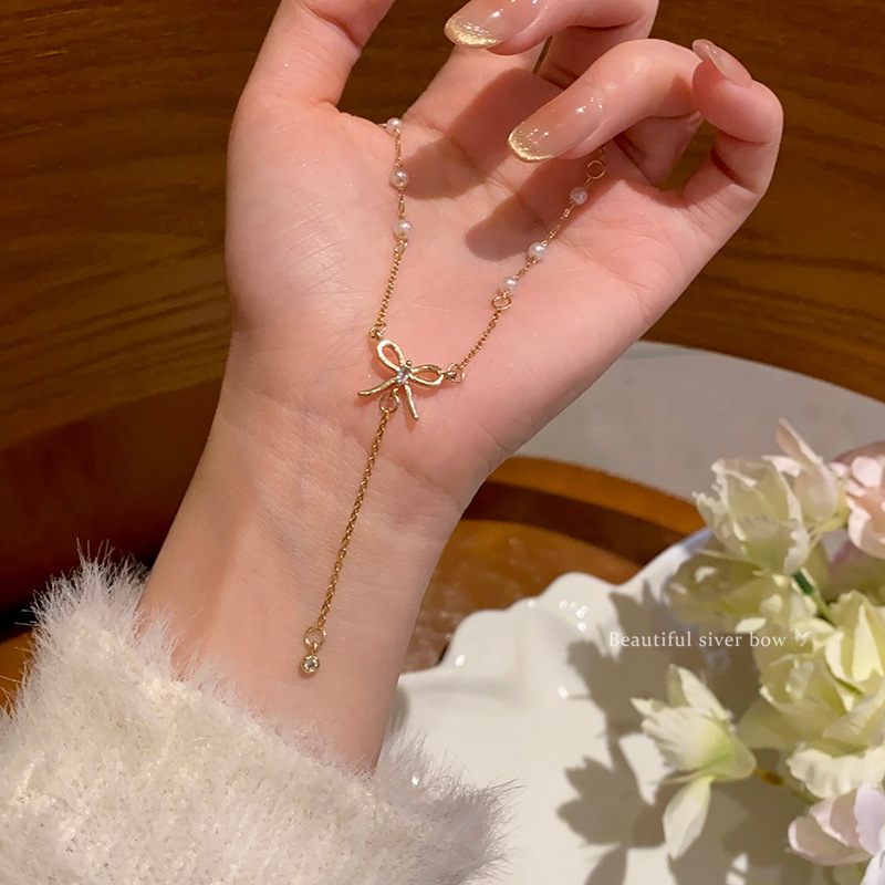 Bow tassel pearl necklace, a stylish and high-end style for women on Instagram, versatile collarbone chain, a popular neckchain accessory Specification drawing