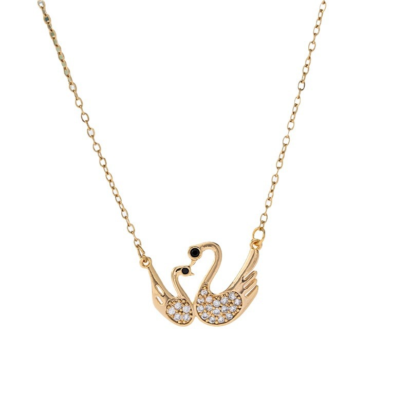 This is a simple and fashionable double swan necklace for women, featuring a niche and light luxury design. It is a popular collarbone chain and a versatile and elegant accessory Item Picture