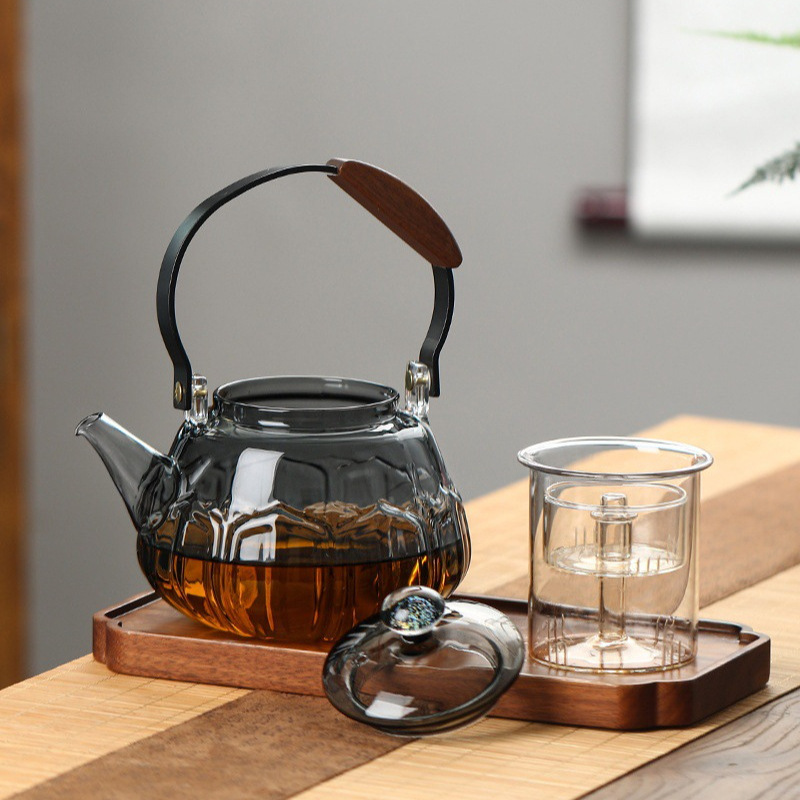 High borosilicate high-temperature resistant glass lotus handle teapot, glass steaming and boiling integrated teapot, large-capacity office brewing teapot details Picture