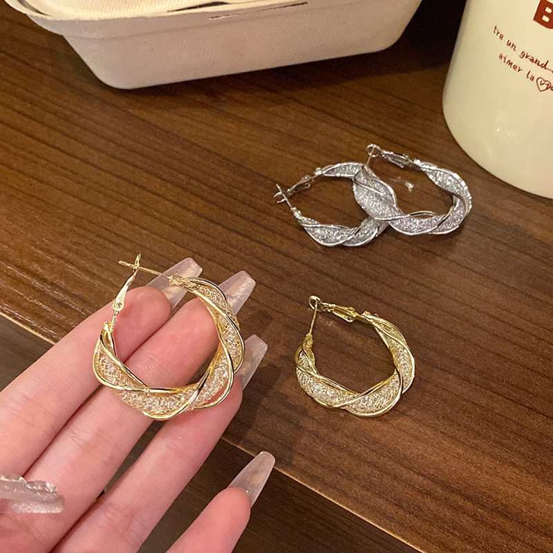 S925 Silver Needle C-shaped hollowed-out crystal earrings are trendy and versatile for women on Instagram. The twisted ear rings exude a sense of light luxury and sophistication full figure