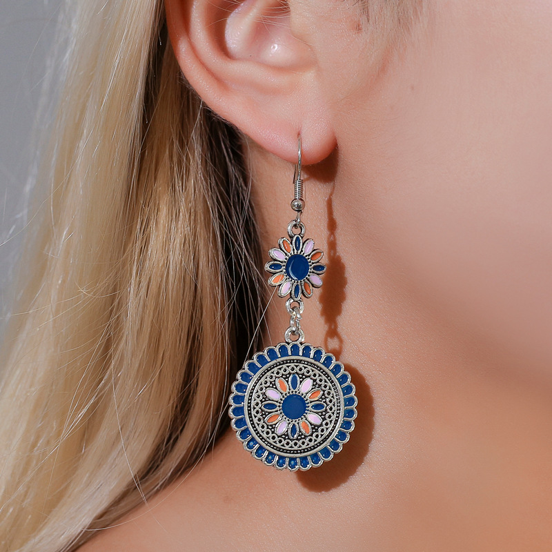 Ethnic-style colorful oil-dripping long small Daisy retro earrings, court-style carved alloy flower totem earrings full figure
