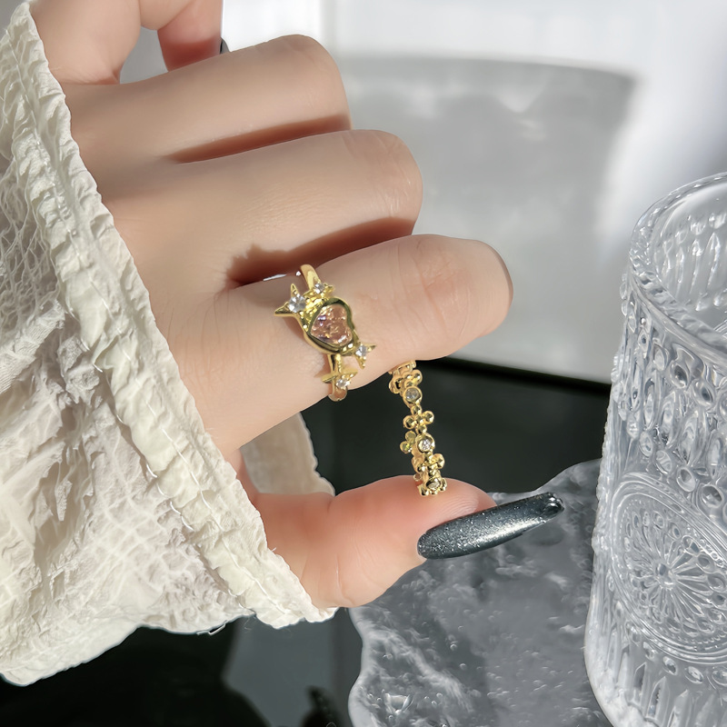 A light luxury retro starlight heart-shaped pink diamond sweet and cool open-top ring for women on Instagram, with a cold style and a niche high-end look full figure