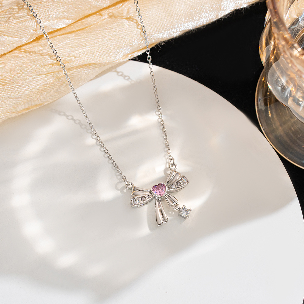 Pink diamond heart-shaped butterfly titanium steel necklace, fashionable, sweet and girlish for women, collarbone chain, elegant and light luxury style accessories wholesale details Picture