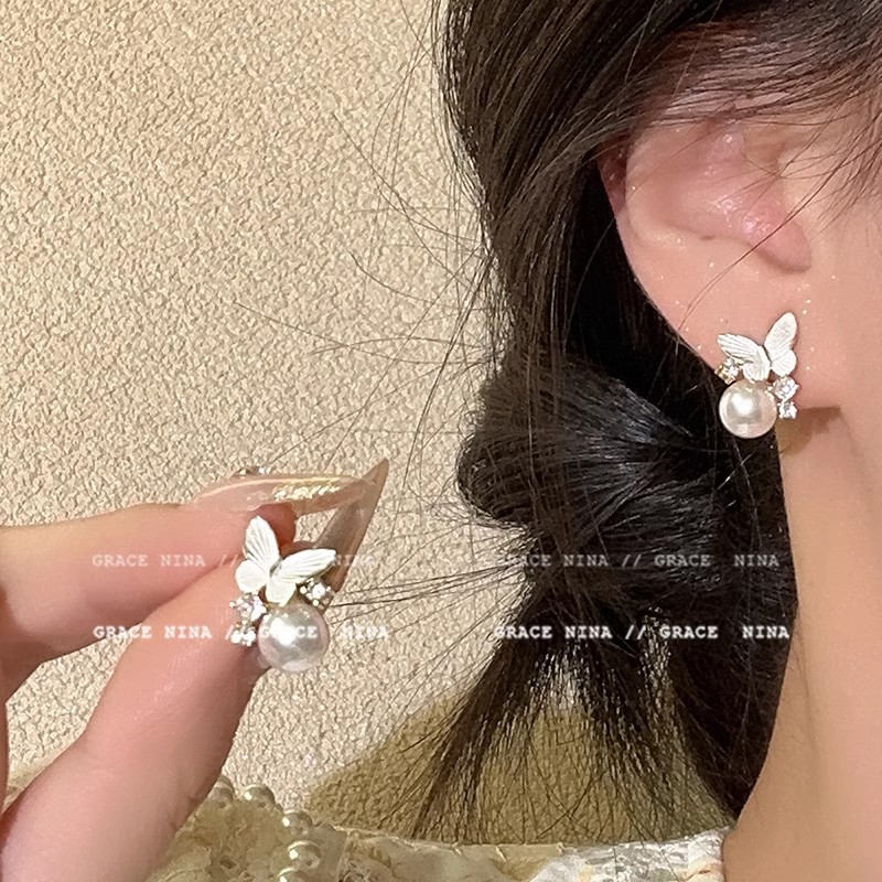 Light luxury glazed butterfly pearl exquisite zircon earrings, new style of elegant and high-end earrings, small and exquisite stud earrings for women full figure